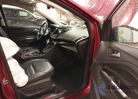 2016 Ford Escape Titanium z USA, uszkodzony, nr VIN 1FMCU9JX0GUC65615